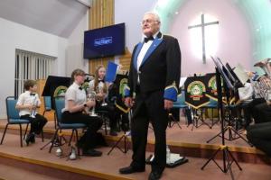 Band member Hughie Marshall with The Ellington Colliery Junior Band 